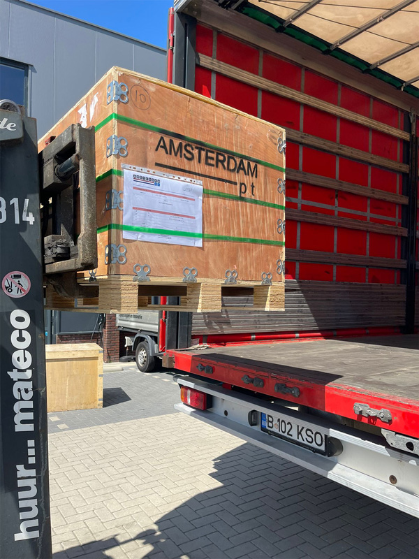 Post tensioning equipment loaded onto transport truck using forklift for shipment